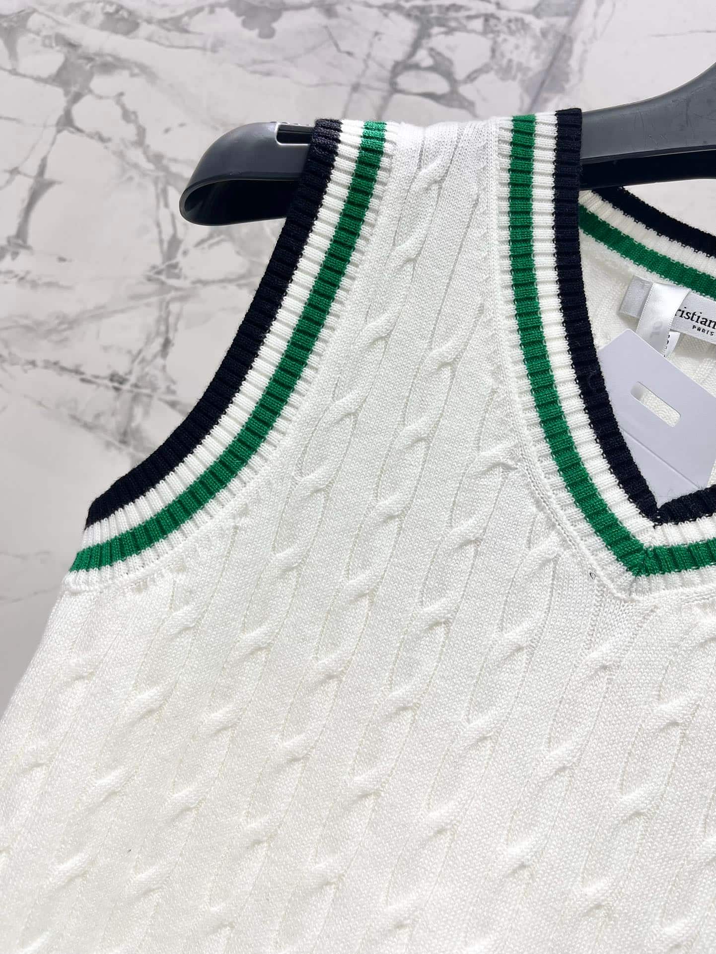 Dior: Sleeveless top, embroidery, stripes, contrast panels, denim