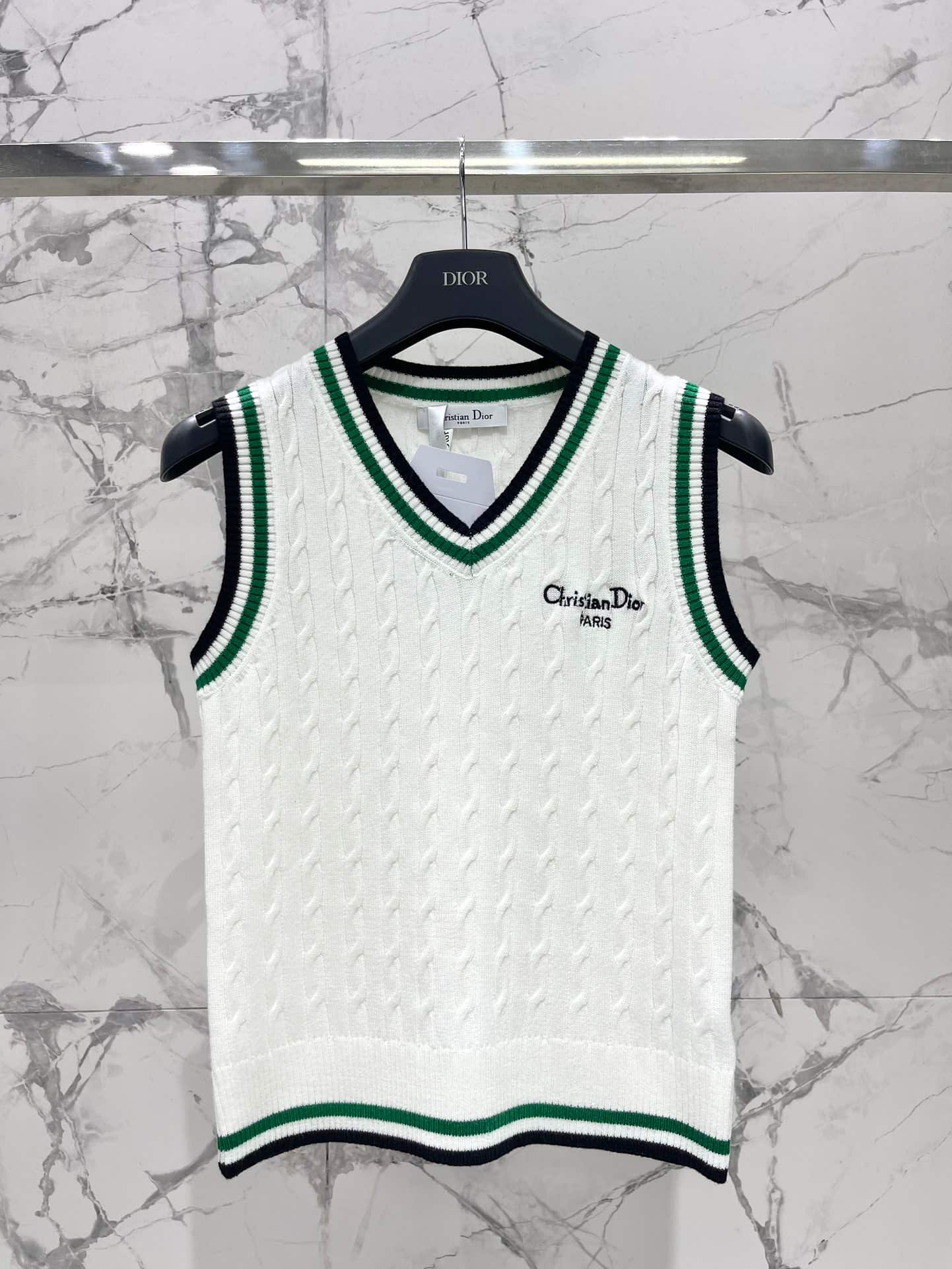 Dior: Sleeveless top, embroidery, stripes, contrast panels, denim