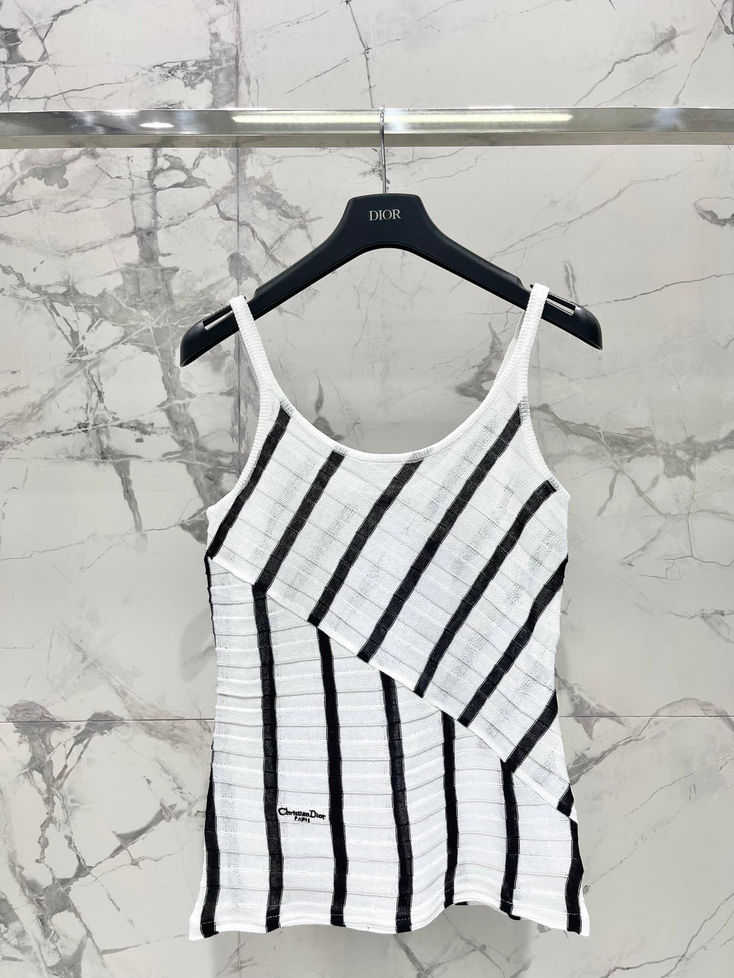 Dior: Sleeveless top, embroidery, stripes, contrast panels, denim
