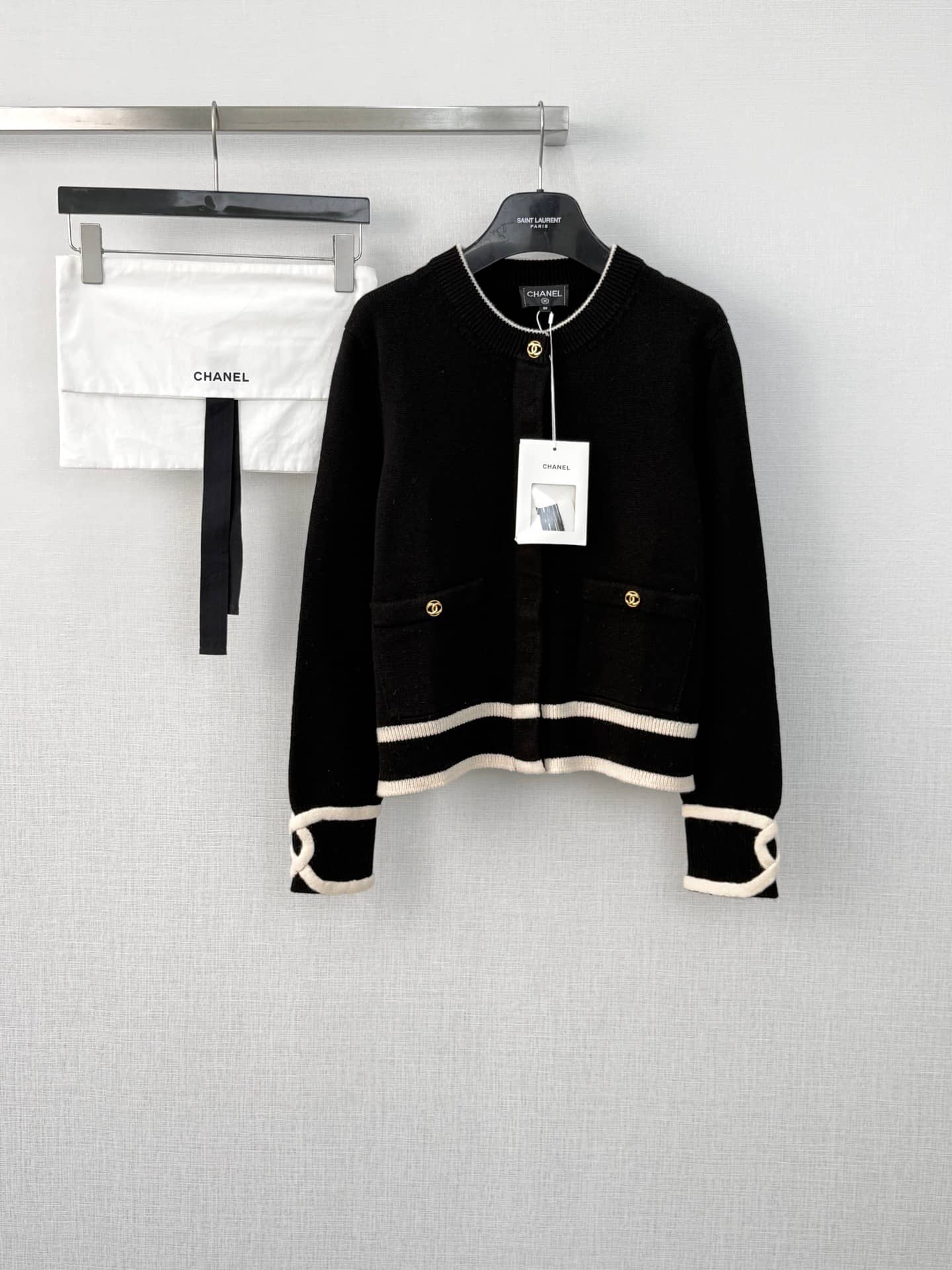 Chanel: Cardigan, contrast panels, pockets, metal hardware