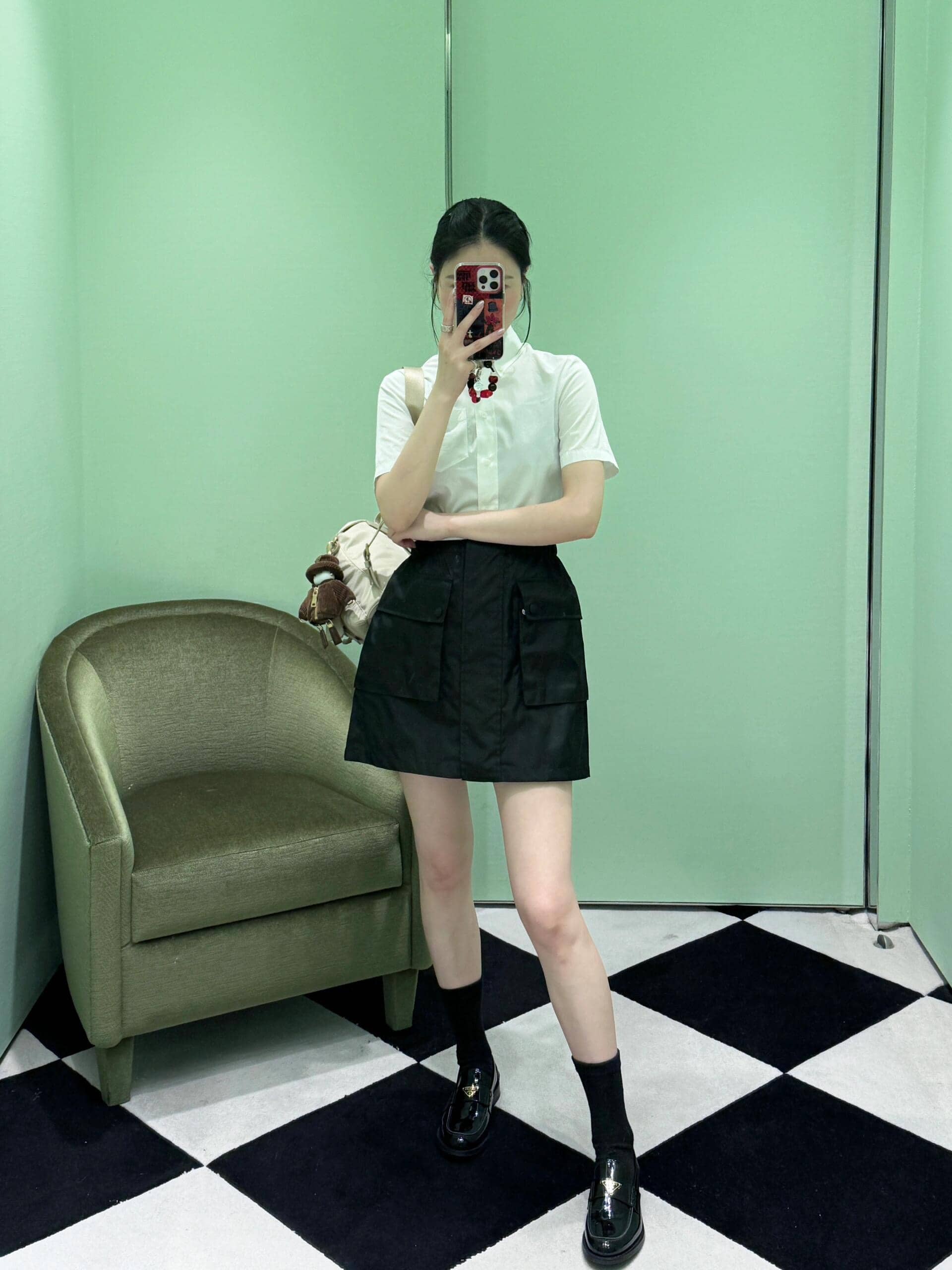 Prada: Skirt, zip fastening, pockets, nylon