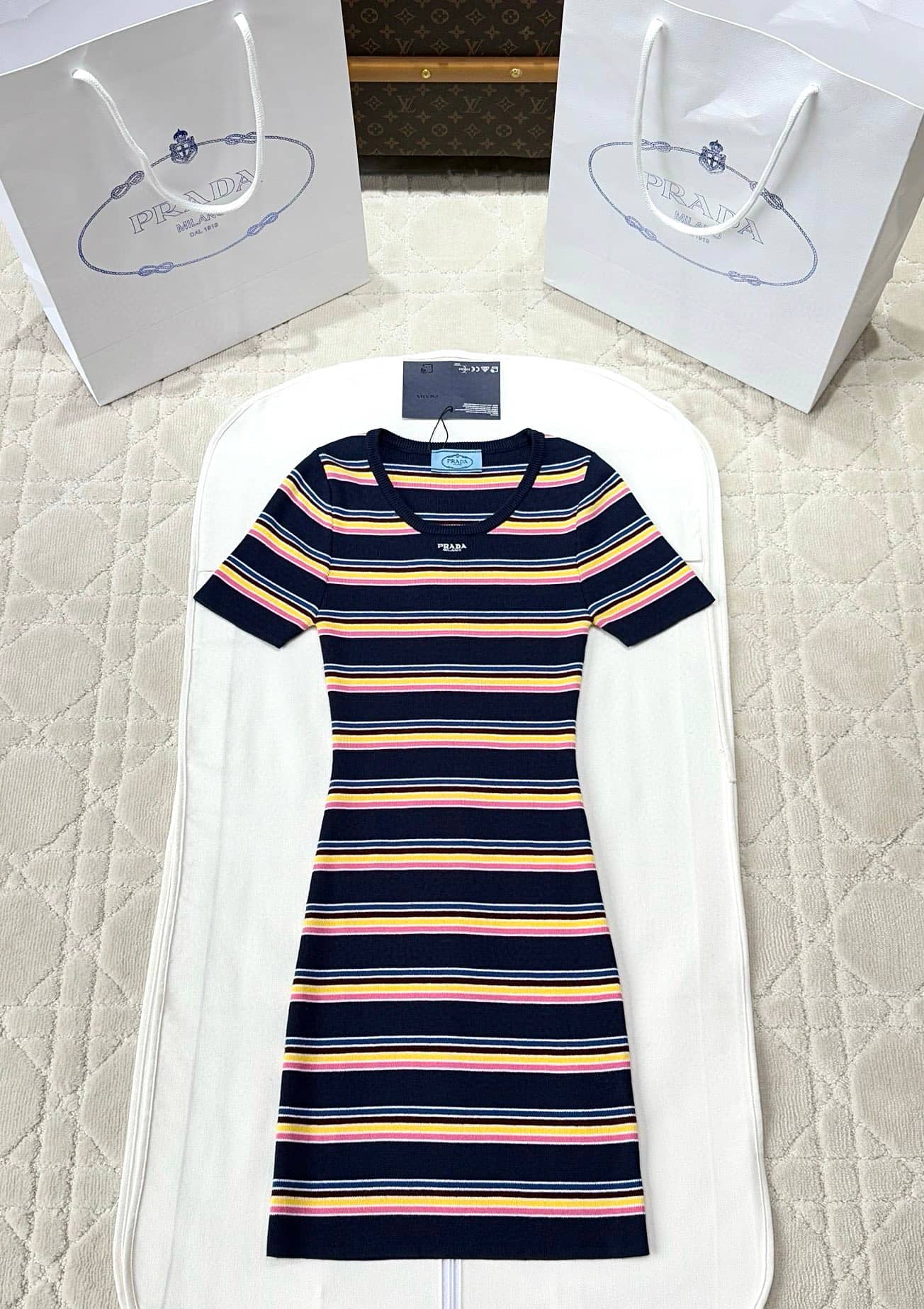 Prada: Skirt, stripes, contrast panels, spring/summer 2025