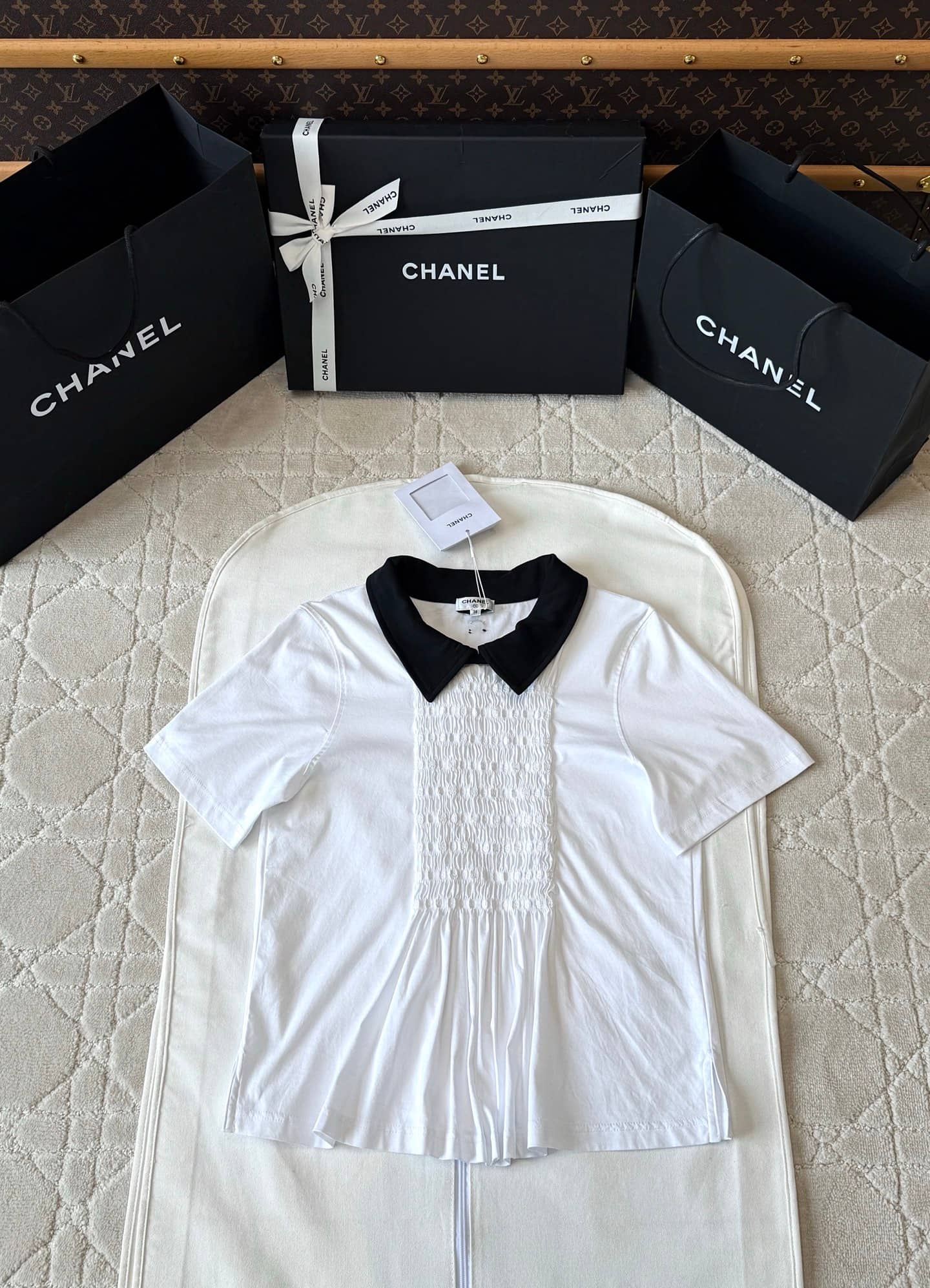 Chanel: Polo shirt, embroidery