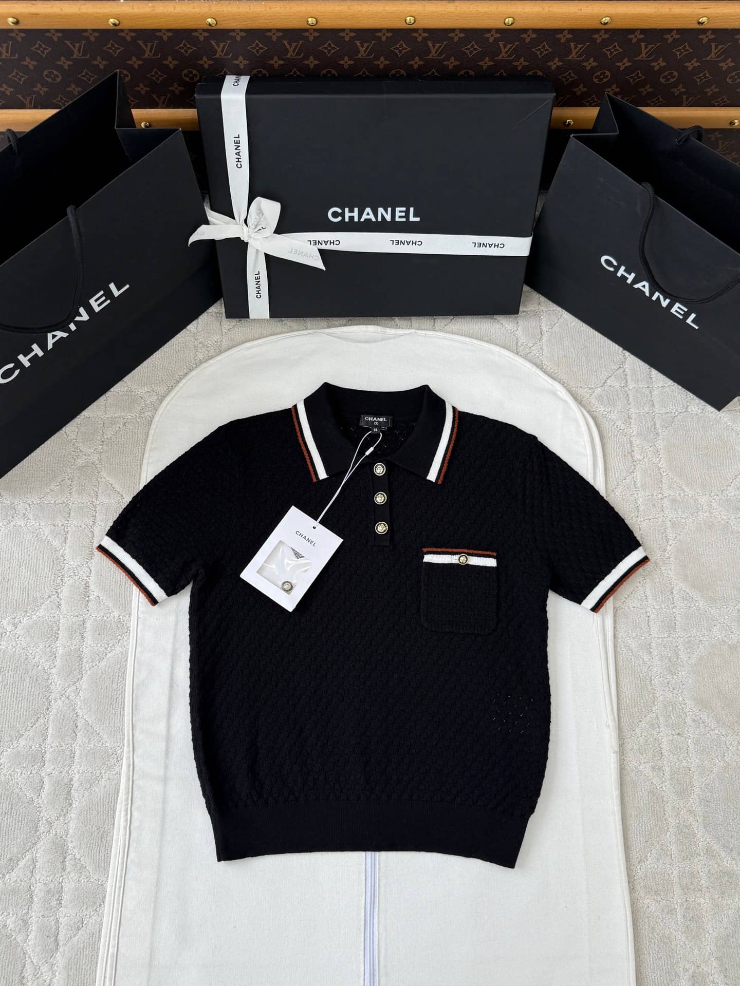 Chanel: Polo shirt, contrast panels